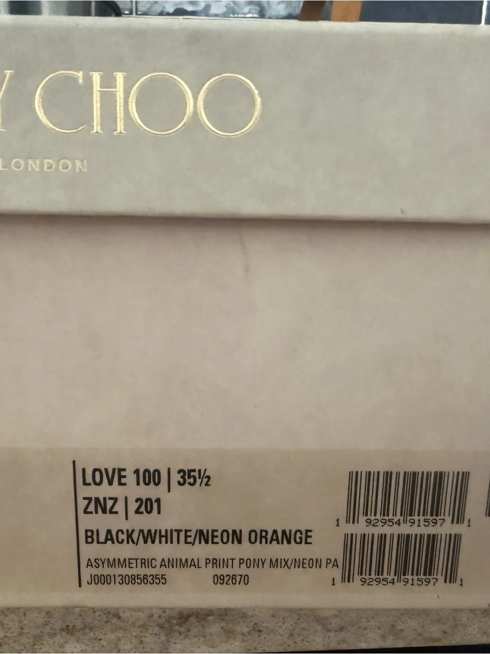 Jimmy Choo Black and White Animal-Print Pointed Pumps with Orange Lining